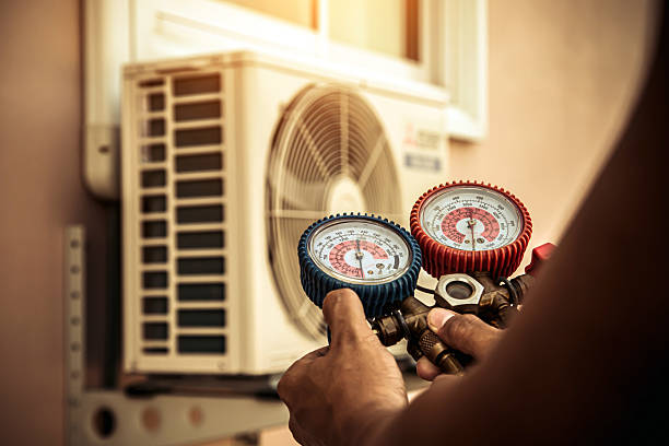 Professional Heat Pump Repair technician working in Maysville, AR